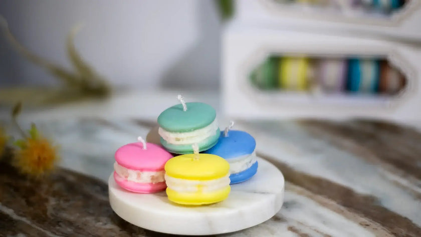 Close-up of Votive handmade macaron-shaped soy candles, vibrant colors, safe and clean burning for any living space