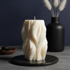 oversized-ribbed-swirl-pillar-candle-scented-design-for-cozy-mornings-elevate-your-space-with-luxurious-aroma-perfect-relaxation-gift-for-mom - lit candle