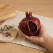 pomegranate-candle-hand-painted-unique-soy-wax-candle-for-home-decor-luxury-gift-holiday-table-centerpiece rephrase