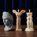 Winged Victory soy candle detail – sculptural Nike of Samothrace bust
