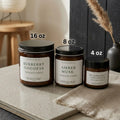 Wickless soy candle size comparison — 4oz, 8oz, and 16oz amber glass jars