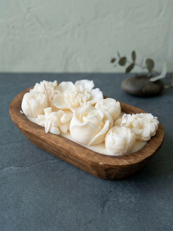 Ivory floral soy wax candle in an 8 inch wooden dough bowl