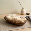 Botanical dough bowl candle shown from above with floral wax details