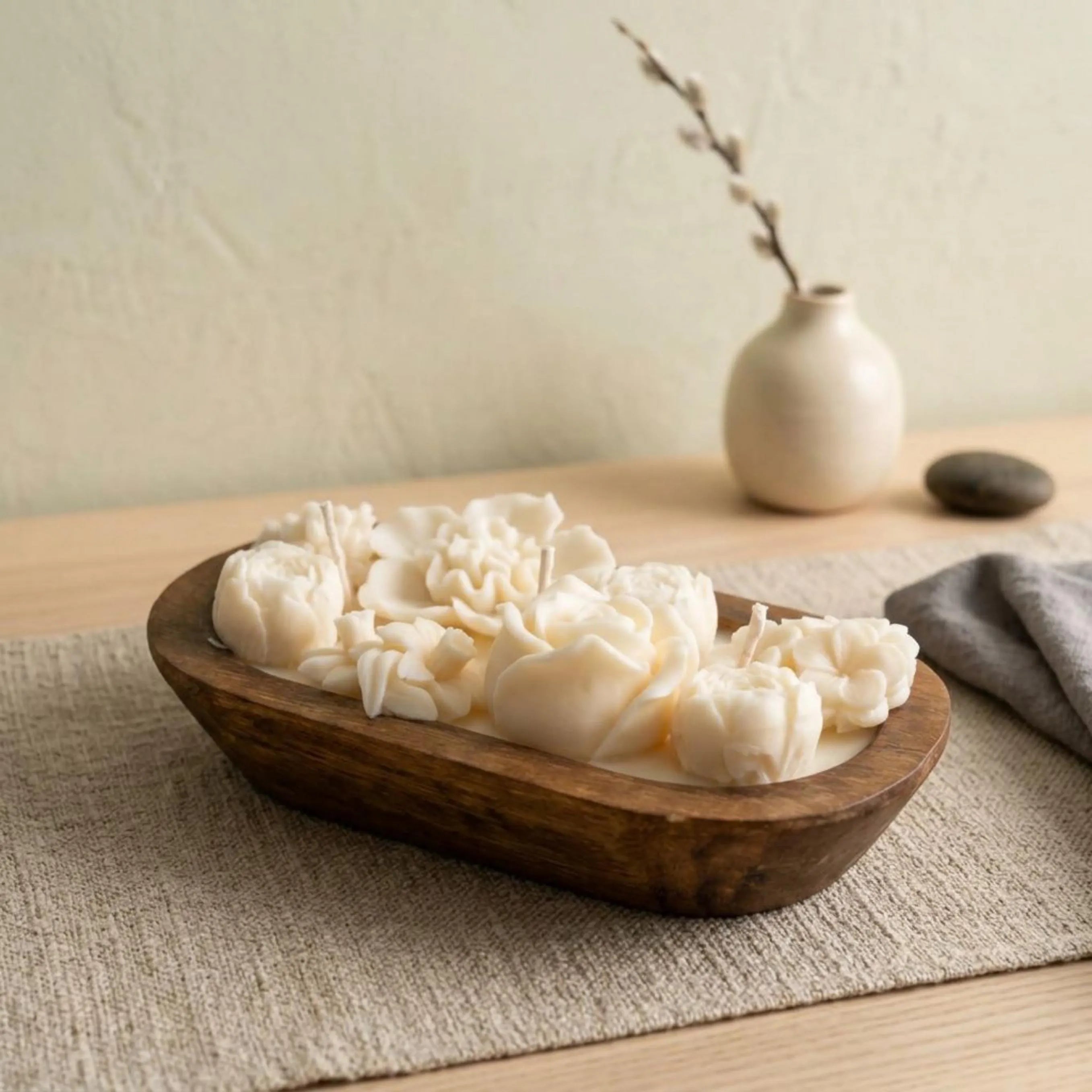 Botanical dough bowl candle shown from above with floral wax details