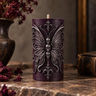 Gothic butterfly pillar candle with sculpted skulls – soy wax sculptural candle – view 4