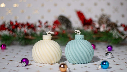 Close-up of the Globe Stripe candle, featuring an elegant round design with textured stripes for a sophisticated seasonal touch.