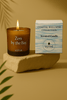 non-toxic natural scented candle in frosted glass jar with wood lid