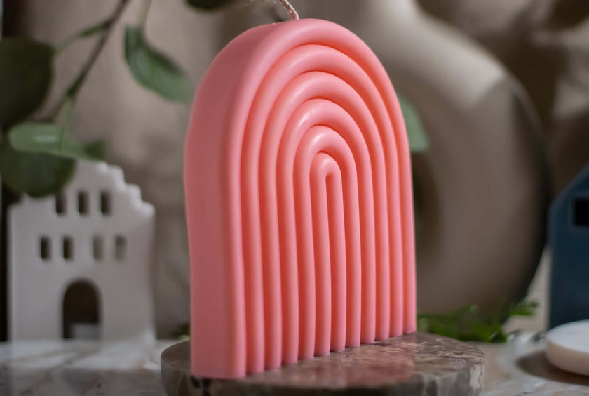 Minimalist arch candle, crafted from sustainable ingredients and infused with a delicate, soothing fragrance.