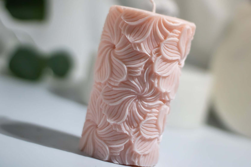 Handcrafted floral-patterned Garden Pillar candle, made from natural soy wax for an elegant and decorative touch.
