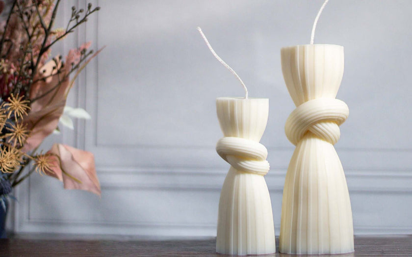 Sculptural knot candle with a warm, inviting fragrance, adding both style and ambiance to any space.