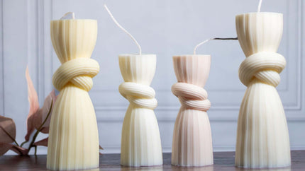 Handcrafted knot-shaped pillar candle made from natural soy wax, blending modern design with artisanal craftsmanship.
