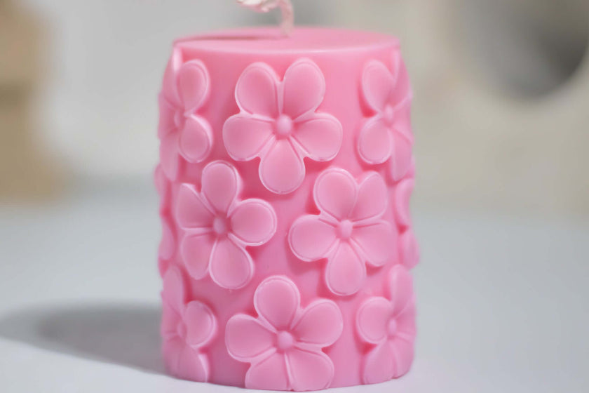 Detailed view of the Sakura candle's label, showcasing Votive's commitment to quality and eco-conscious craftsmanship.